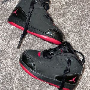 Pink and black baby Nike Jordan’s size 4